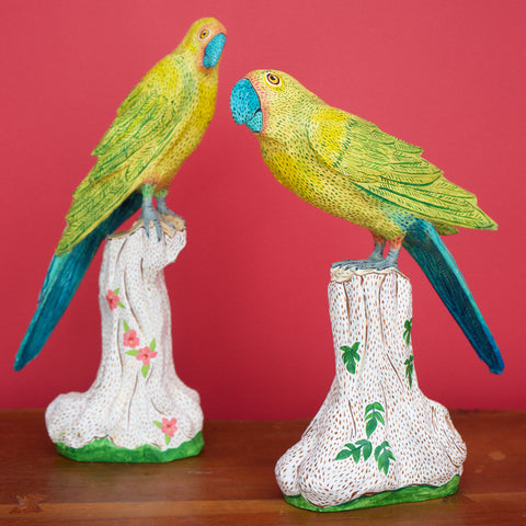 Mark Gagnon, Pair of Yellow and Blue Papier Mache Parrots on Tree Trunks